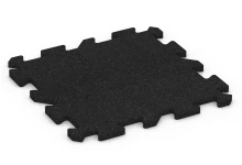Dalle amortissante à emboîtement puzzle
