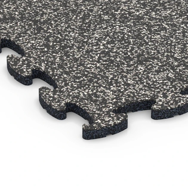 La vue détaillée sur les bords du produit WARCO 6751, Dalle aire de jeux, au format 44,6 x 44,6 x 1,8 cm, en couleur Granit gris foncé.