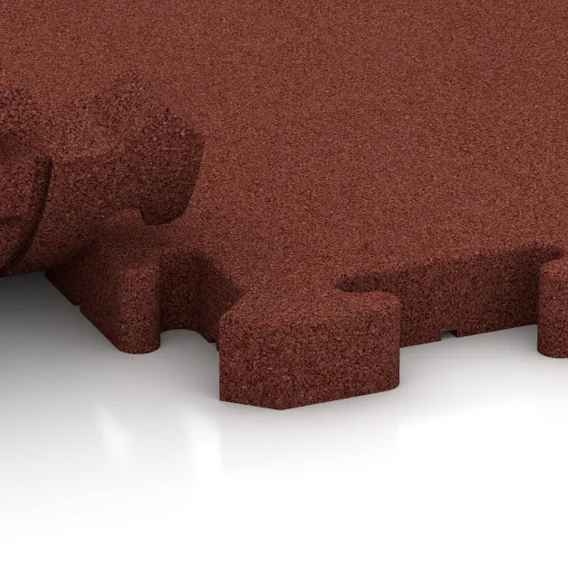 Le gros plan sur le système de connexion des revêtements de sol WARCO 5879 - Dalle événementielle pour extérieur en couleur Rouge brique. Les dimensions 500 x 500 x 40 mm.