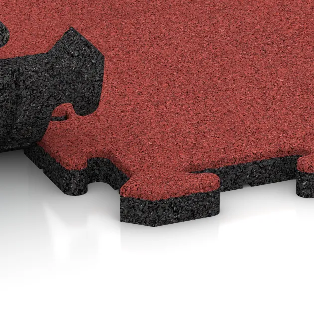 Le gros plan sur le système de connexion des revêtements de sol WARCO 6025 - Carreau d’escalier en couleur Rouge corail. Les dimensions 1000 x 1000 x 30 mm.