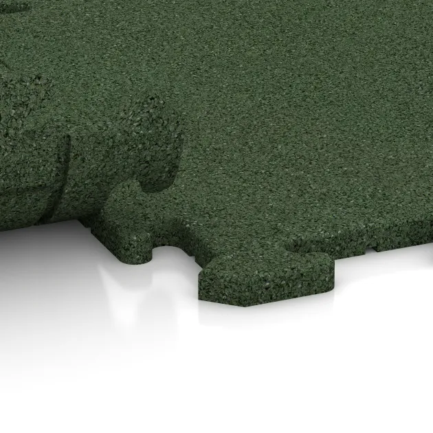 Le gros plan sur le système de connexion des revêtements de sol WARCO 0178 - Revêtement en caoutchouc pour escaliers en couleur Vert gazon. Les dimensions 500 x 500 x 18 mm.