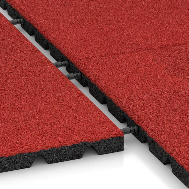 Le gros plan sur le système de connexion des revêtements de sol WARCO 5474 - Dalle amortissante 3 cm - EN 1177 ≤ 100 cm en couleur Rouge corail. Les dimensions 500 x 500 x 30 mm.