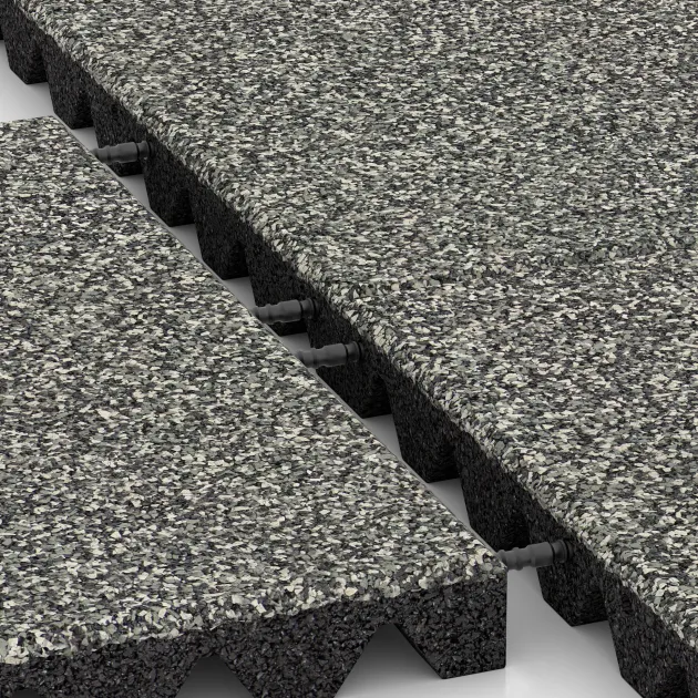 Großaufnahme vom Verbindungssystem von WARCO-Boden 5543 - Fallschutzplatte 4,5 cm - EN 1177 ≤ 135 cm im Farbdesign Grauer Granit. Abmessungen 500 x 500 x 45 mm.