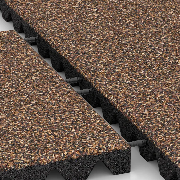 Le gros plan sur le système de connexion des revêtements de sol WARCO 0645 - Dalle amortissante en couleur Café au lait. Les dimensions 500 x 500 x 45 mm.