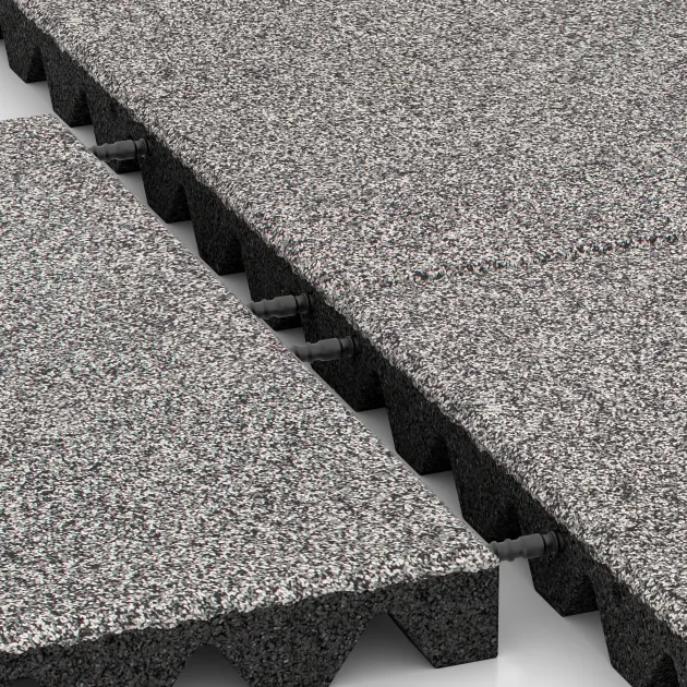 Le gros plan sur le système de connexion des revêtements de sol WARCO 4475 - Dalle amortissante en couleur Gris mélange. Les dimensions 500 x 500 x 45 mm.