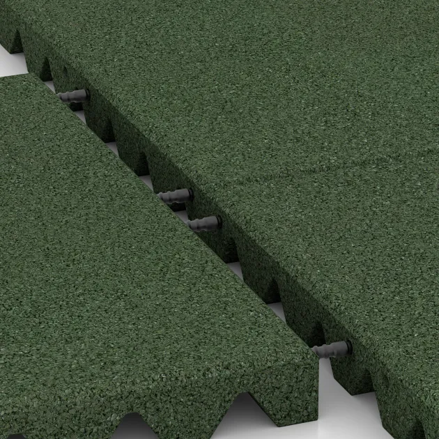 Le gros plan sur le système de connexion des revêtements de sol WARCO 3864 - Dalle acoustique en couleur Vert gazon. Les dimensions 500 x 500 x 45 mm.