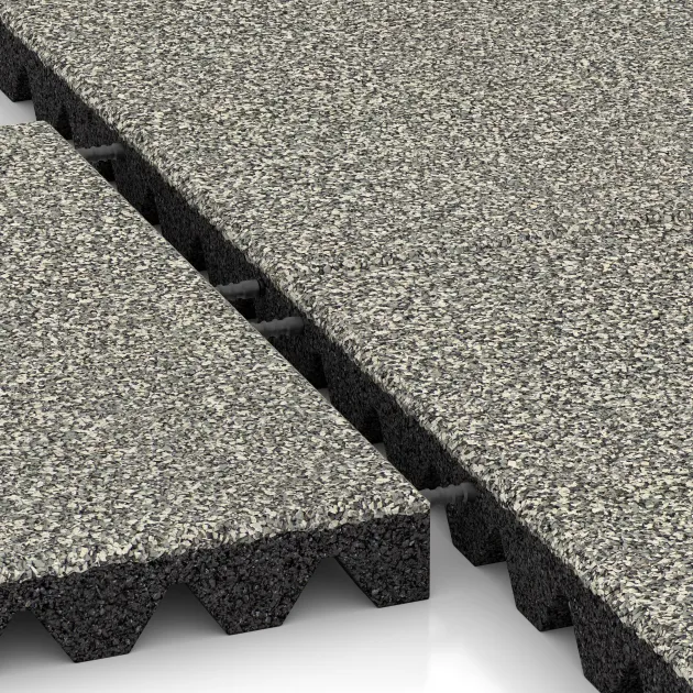 Großaufnahme vom Verbindungssystem von WARCO-Boden 5350 - Fallschutzplatte im Farbdesign Heller Granit. Abmessungen 500 x 500 x 50 mm.