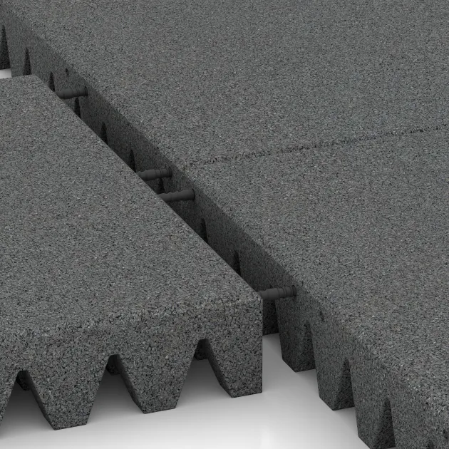 Le gros plan sur le système de connexion des revêtements de sol WARCO 0729 - Dalle amortissante en couleur Gris ardoise. Les dimensions 500 x 500 x 80 mm.