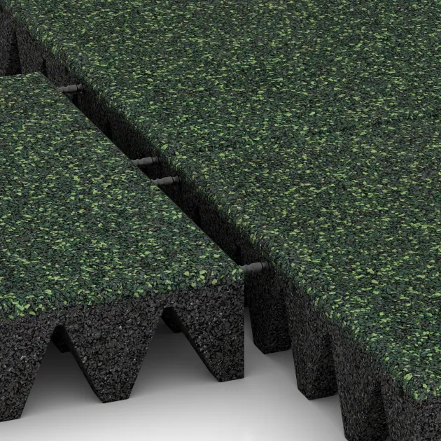 Le gros plan sur le système de connexion des revêtements de sol WARCO 3709 - Dalle amortissante en couleur Pelouse anglaise. Les dimensions 500 x 500 x 100 mm.