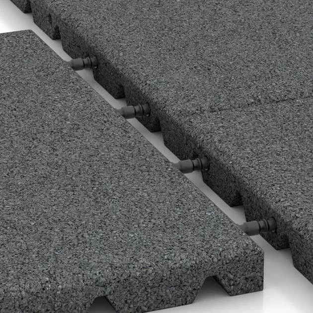 Le gros plan sur le système de connexion des revêtements de sol WARCO 0523 - Dalle amortissante en couleur Gris ardoise. Les dimensions 400 x 400 x 30 mm.