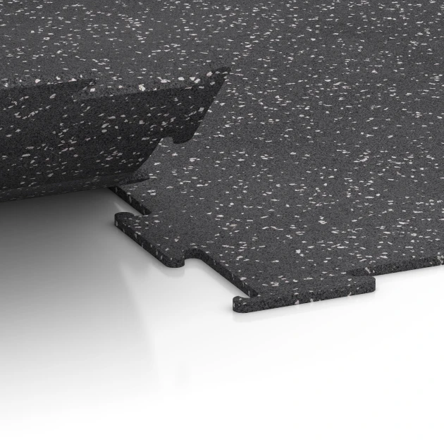 Großaufnahme vom Verbindungssystem von WARCO-Boden 6452 - Fitnessboden Kompakt im Farbdesign Leicht Grau Gesprenkelt. Abmessungen 100 × 100 × 0,8 cm.