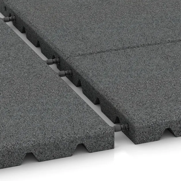 Le gros plan sur le système de connexion des revêtements de sol WARCO 0382 - Demi-plaque en couleur Gris ardoise. Les dimensions 500 x 250 x 30 mm.