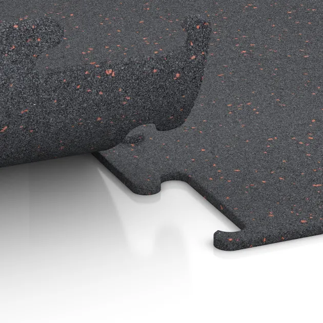 Le gros plan sur le système de connexion des revêtements de sol WARCO 3753 - Revêtement sportif Fitness Performance Elite en couleur Rouge doux moucheté. Les dimensions .