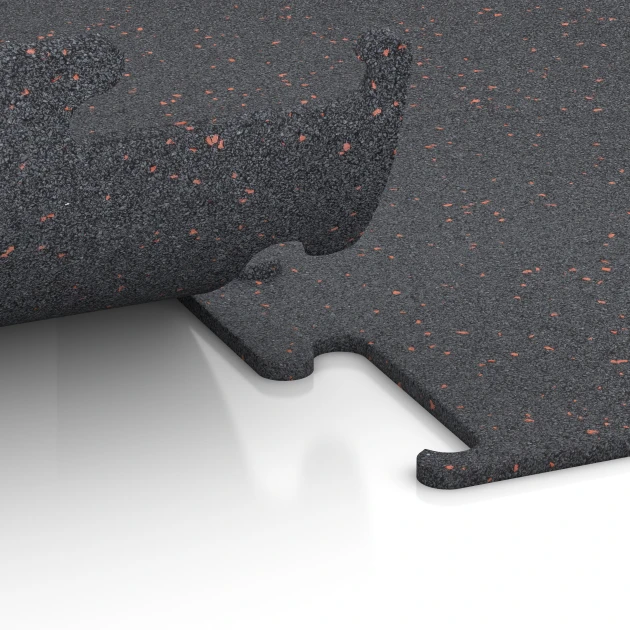 Le gros plan sur le système de connexion des revêtements de sol WARCO 3753 - Revêtement sportif Fitness Performance Elite en couleur Rouge doux moucheté. Les dimensions 100 x 100 x 1 cm | 1,00 m².