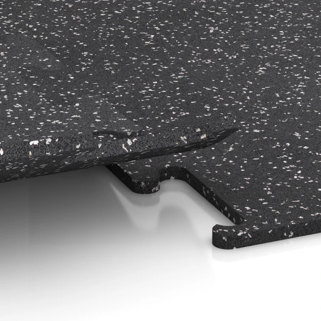 Le gros plan sur le système de connexion des revêtements de sol WARCO 3780 - Revêtement sportif Fitness Performance Elite en couleur Gris doux moucheté. Les dimensions 50 x 50 x 1,5 cm | 0,25 m².