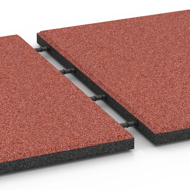 Le gros plan sur le système de connexion des revêtements de sol WARCO 6288 - Dalles amortissantes en couleur Rouge tomate. Les dimensions 50 x 50 x 3 cm.