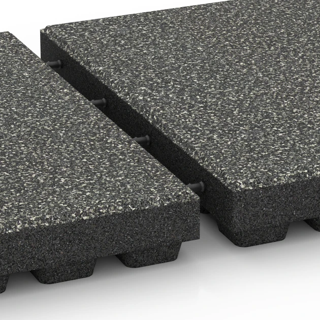 Le gros plan sur le système de connexion des revêtements de sol WARCO 6440 - Dalle amortissante – 210 cm en couleur Granit gris foncé. Les dimensions 50 x 50 x 7 cm.