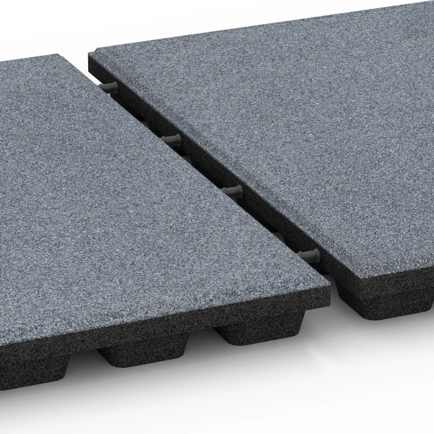 Le gros plan sur le système de connexion des revêtements de sol WARCO 6294 - Dalles amortissantes en couleur Gris graphite. Les dimensions 50 x 50 x 4,8 cm.