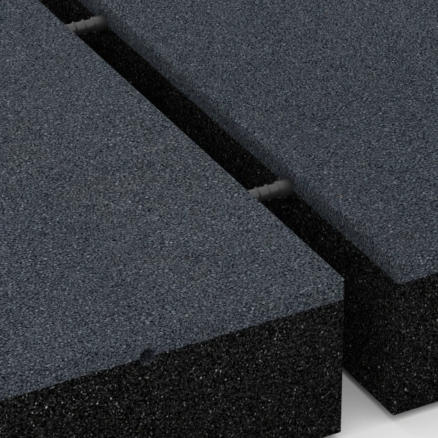 Großaufnahme vom Verbindungssystem von WARCO-Boden 6230 - Fallschutzplatten im Farbdesign Schiefergrau. Abmessungen 50 x 50 x 11 cm.