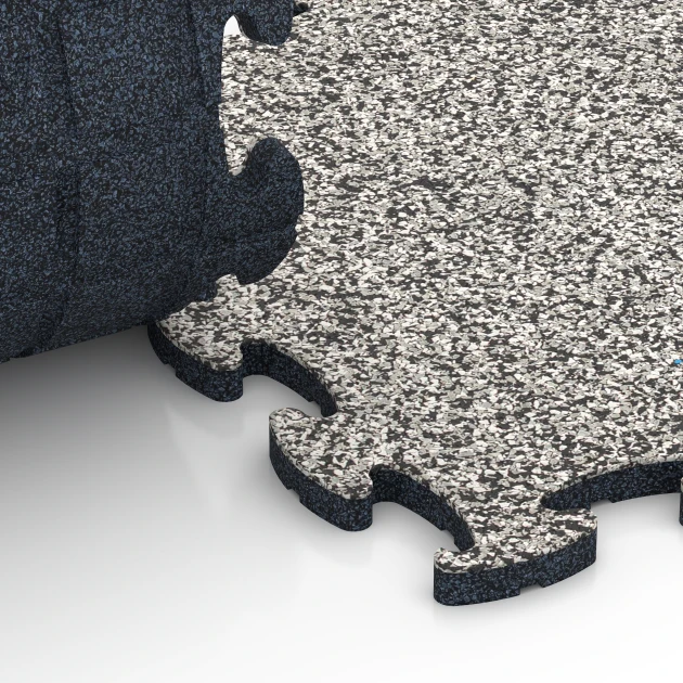 Le gros plan sur le système de connexion des revêtements de sol WARCO 6797 - Sol agility pour chiens en couleur Granit gris. Les dimensions 44,6 x 44,6 x 1,8 cm.