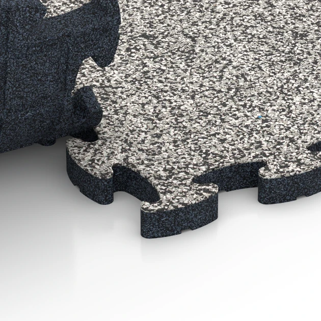 Le gros plan sur le système de connexion des revêtements de sol WARCO 6941 - Dalle de terrasse en couleur Granit gris. Les dimensions 44,6 x 44,6 × 2,8 cm.