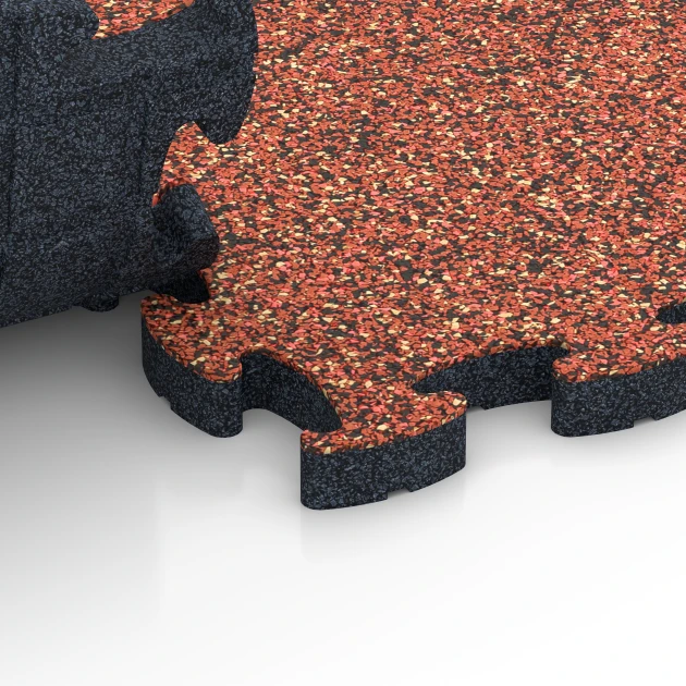 Le gros plan sur le système de connexion des revêtements de sol WARCO 6845 - Fitness Active dalle en couleur Etna. Les dimensions 44,6 x 44,6 × 2,8 cm.